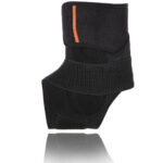 Czarny stabilizator nadgarstka z elastycznym pasem i pomarańczową wstawką, zapewniający wsparcie i kompresję.