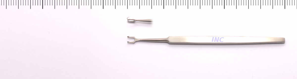 Zestaw narzędzi z dwoma metalowymi wyciskaczami, jednym małym i jednym dłuższym, na białym tle.