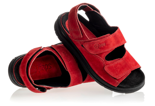 Czerwone i czarne ortopedyczne sandały z dwoma rzepami, przeznaczone dla dzieci, z miękką podeszwą i stabilnym wsparciem.