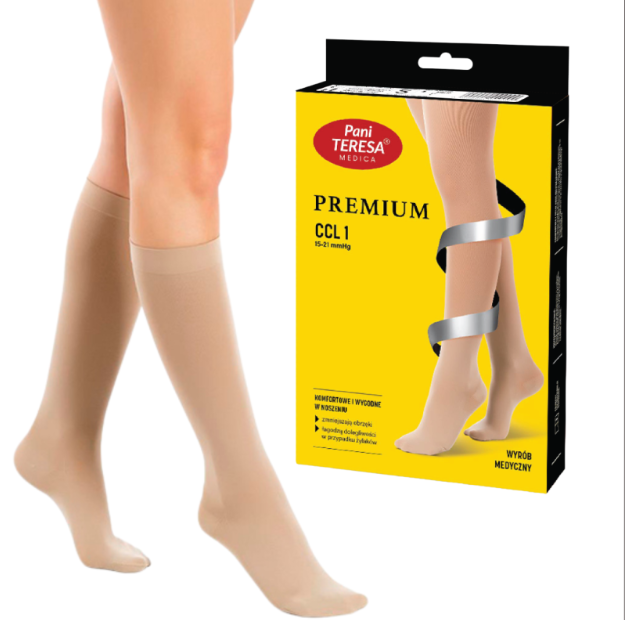 Para cienkich, beżowych pońcuchów uciskowych na nogi, w opakowaniu z żółtą i czarną grafiką, z logo Pani Teresa.