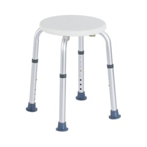 Stolik na czterech regulowanych nogach z okrągłym, białym blatem.