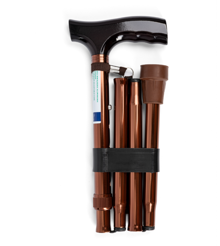 Laska, trzy składane kijki trekkingowe z czarnym uchwytem i brązowymi aluminiowymi rurkami, trzymane na czarnej taśmie.