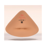 Miękka proteza piersiowa w kształcie trójkąta, w kolorze cielistym, z nadrukiem informacji o modelu, rozmiarze i certyfik
